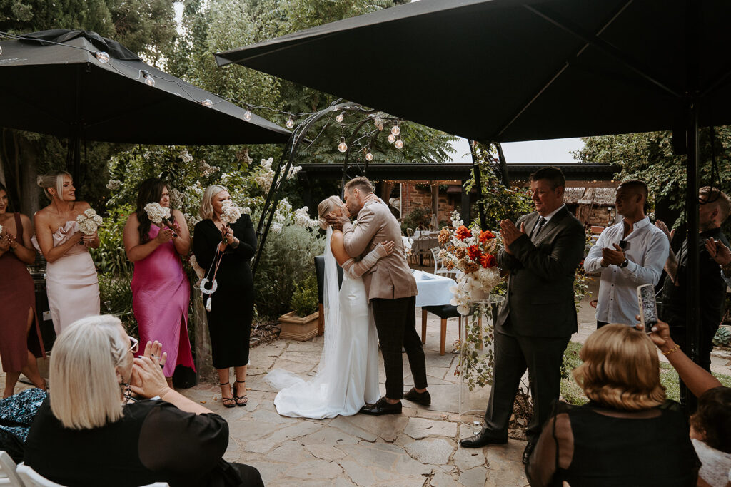 Intimate outdoor wedding ceremony at Goldmines Hotel Bendigo