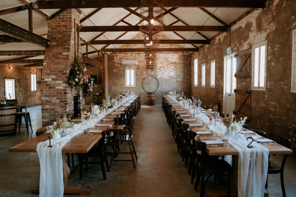 Wedding reception table styling at The Stables of the Ravenswood Homestead